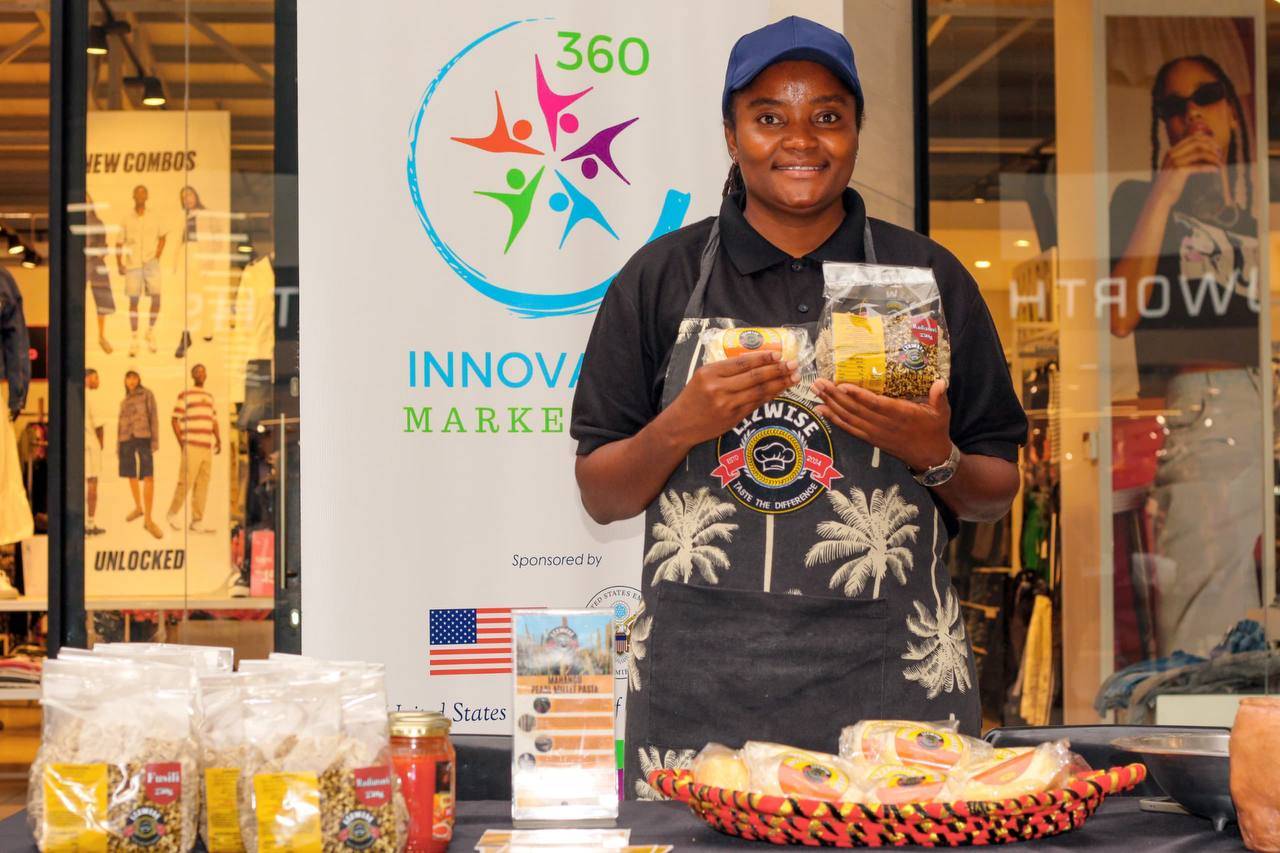 LizWise stand at innovation market sponsored by USA/UN